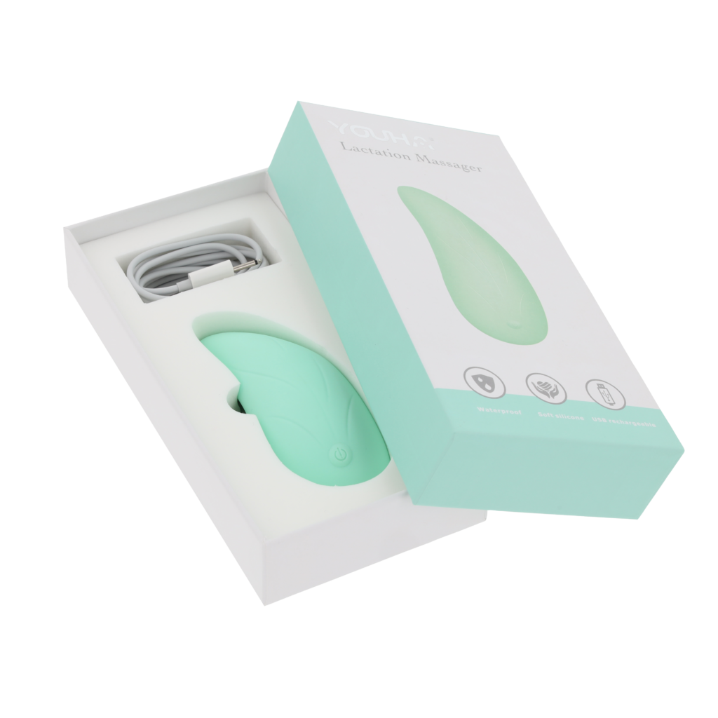 Mintgroene massager in een open verpakking, productfoto